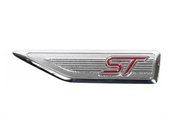 Emblemat "st" lewy na błotnik Focus 05-08 - 6M5Y-16098-AC, 1406283, oryginał Ford OE